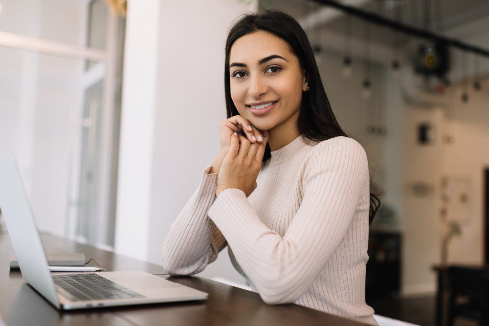 beautiful-indian-woman-freelancer-using-laptop-working-from-home-student-studying-distance-learning-online-education-concept (1)